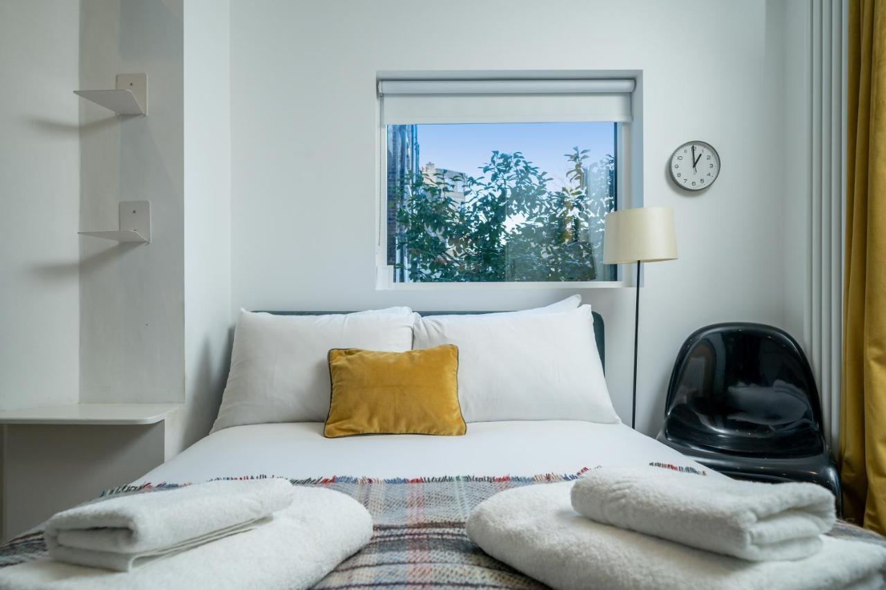 Sleek Flat With Communal Courtyard Londra Esterno foto